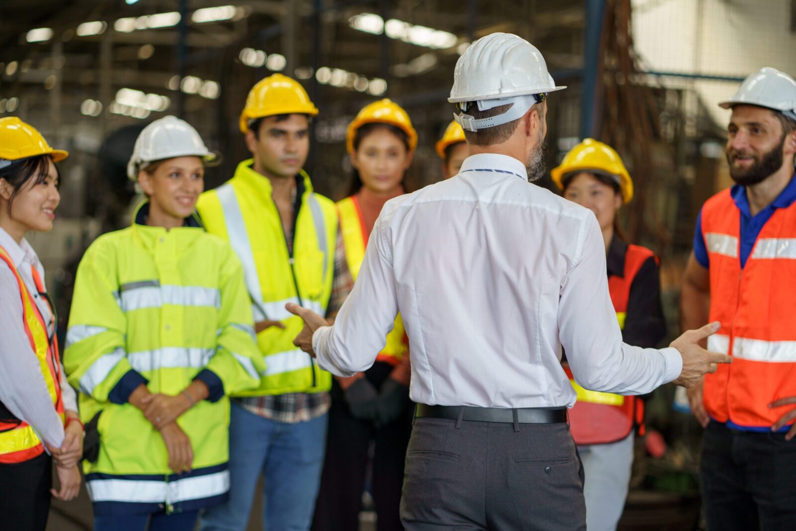A group of engineers being trained at an engineering business